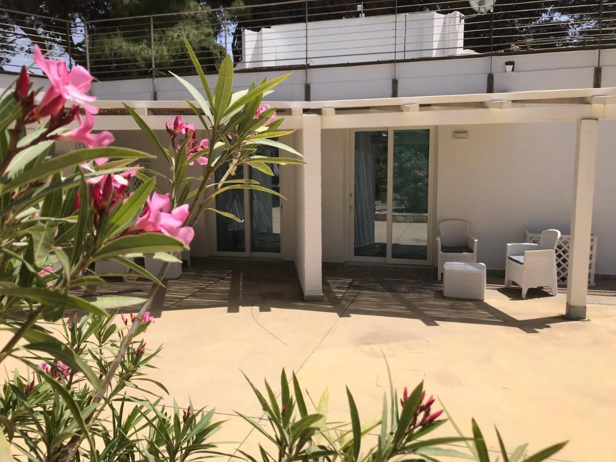 Angolo Mare Apartments & Rooms Porto Pino Luaran gambar