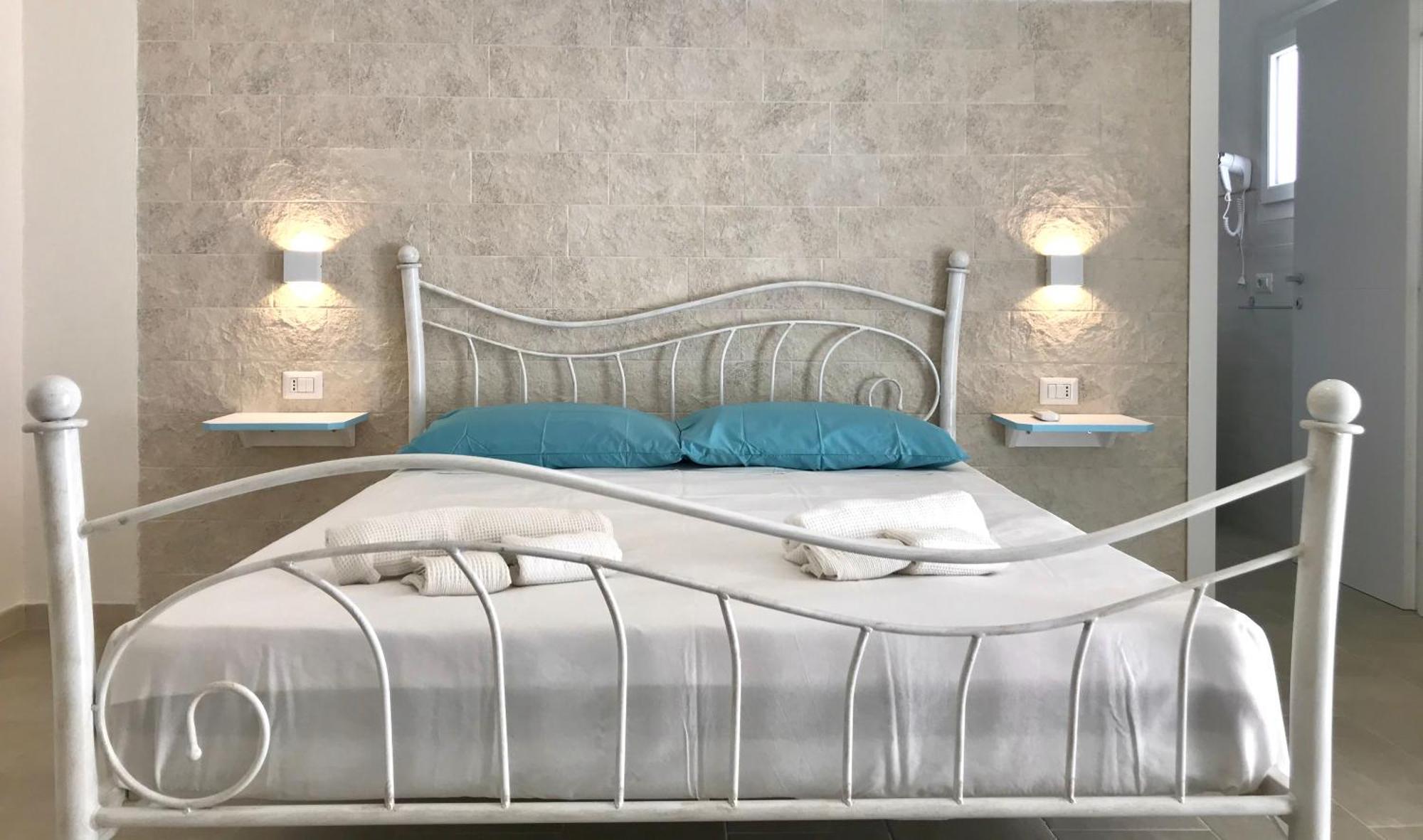 Angolo Mare Apartments & Rooms Porto Pino Luaran gambar
