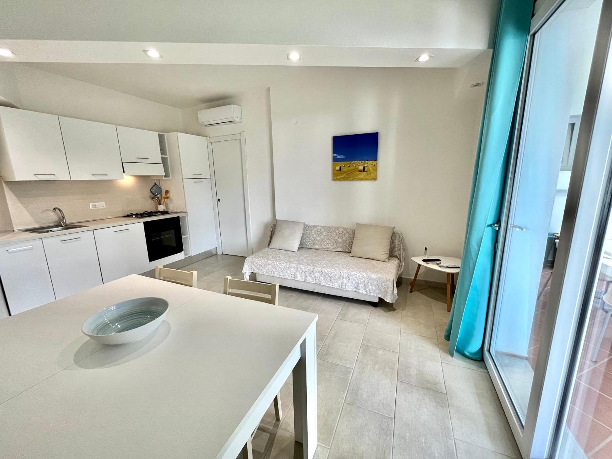 Angolo Mare Apartments & Rooms Porto Pino Luaran gambar
